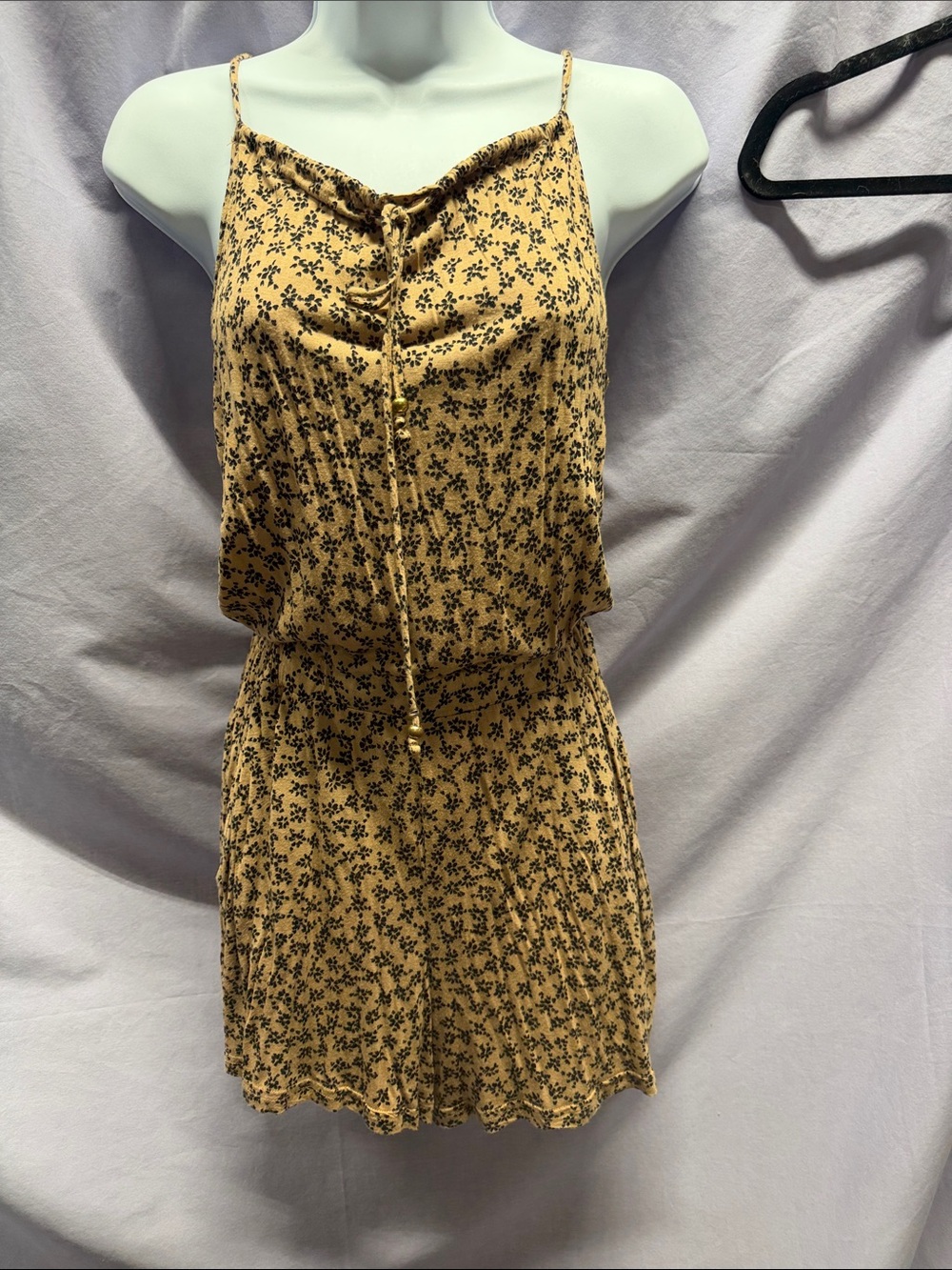Divided Tan and Black Floral Spaghetti-Strap Romper